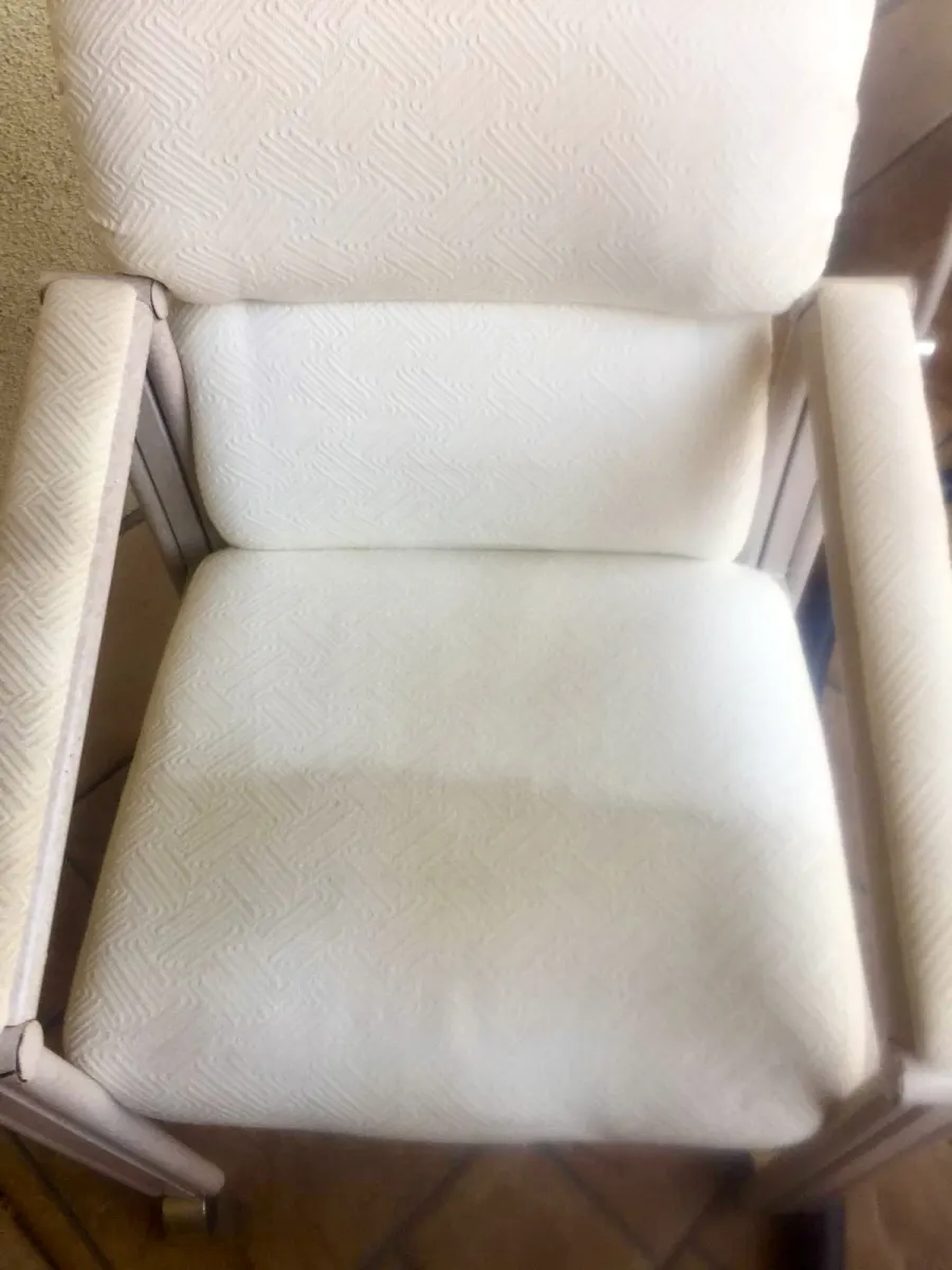 Ivory armchair with stains before upholstery cleaning Ivory armchair with stains before upholstery cleaning
