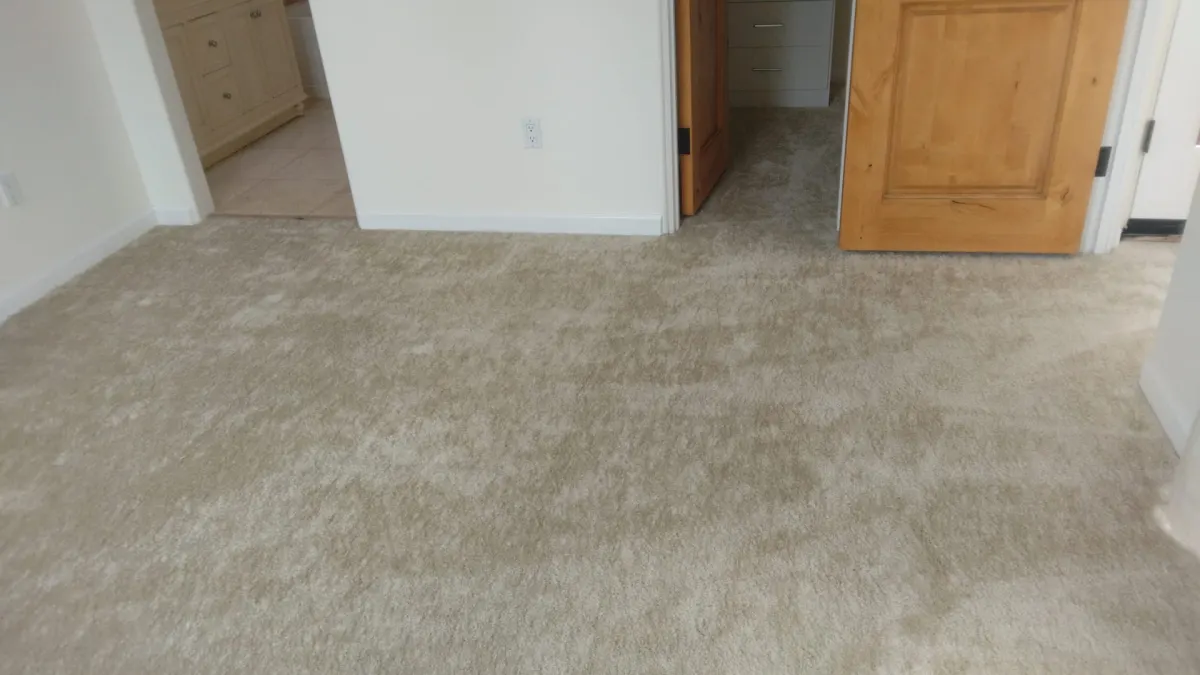 Freshly cleaned white carpet in a bedroom Freshly cleaned white carpet in a bedroom